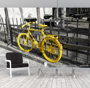 Picture of Yellow bicycle on the gray background